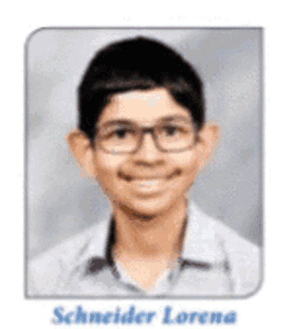 schneider lorena is a young boy wearing glasses and a white shirt .