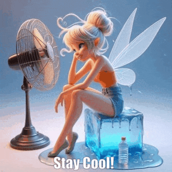 a fairy is sitting on a cube of ice next to a fan .