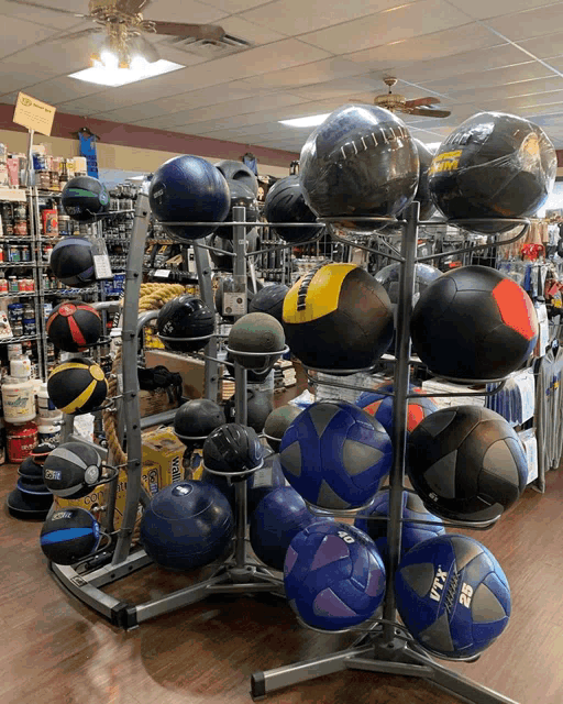 a bunch of balls are on display in a store and one of them has the number 25 on it