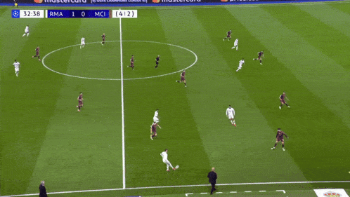 a soccer game is being played in front of a qatar airways advertisement