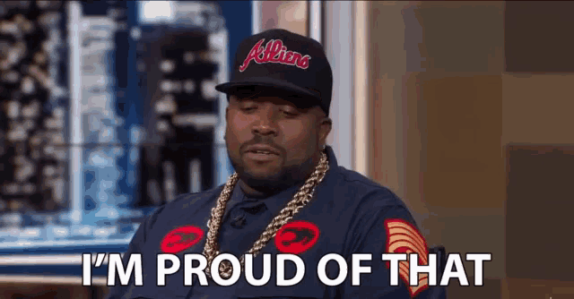 a man wearing a hat that says allians is proud of that