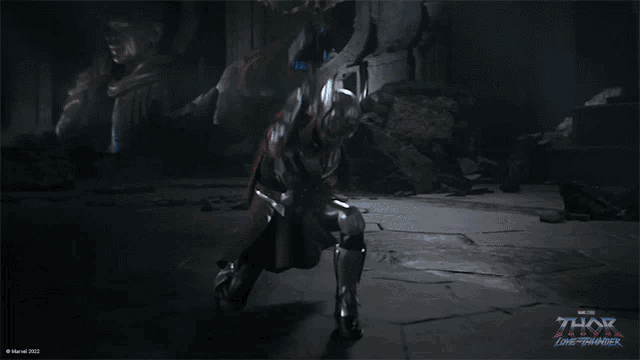 a poster for thor the dark world shows a man being struck by lightning