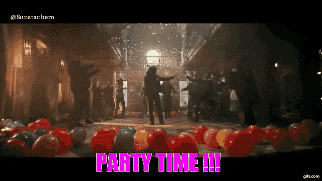 a group of people dancing in a room with balloons and the words party time written in pink