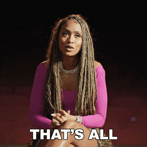 a woman in a pink top is sitting down with the words that 's all above her