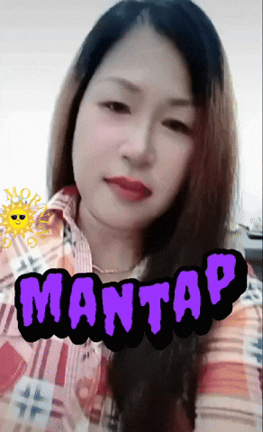 a woman wearing a plaid shirt has the word mantas on her shirt