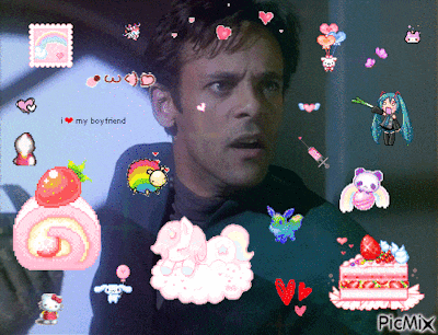 a man is surrounded by pink stickers including a cake and a strawberry
