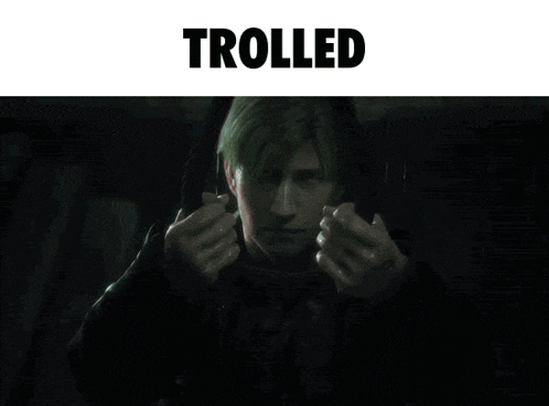 a person holding another person 's head with the word trolled below them