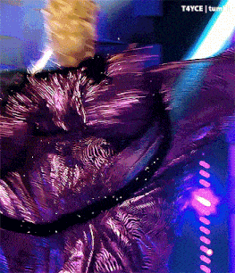 a woman in a purple dress is dancing in front of a blue background with the words t4yce tumblr on the bottom right