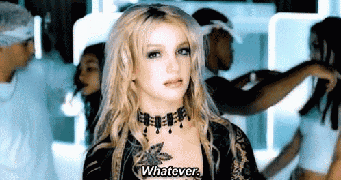 britney spears is wearing a choker necklace and dancing in a video .