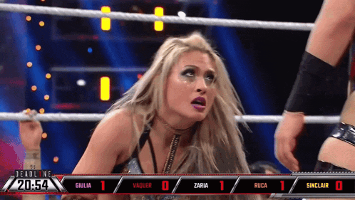 a woman in a wrestling ring with the numbers 20454 on the bottom
