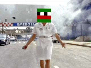 a nurse walking in front of an emergency sign