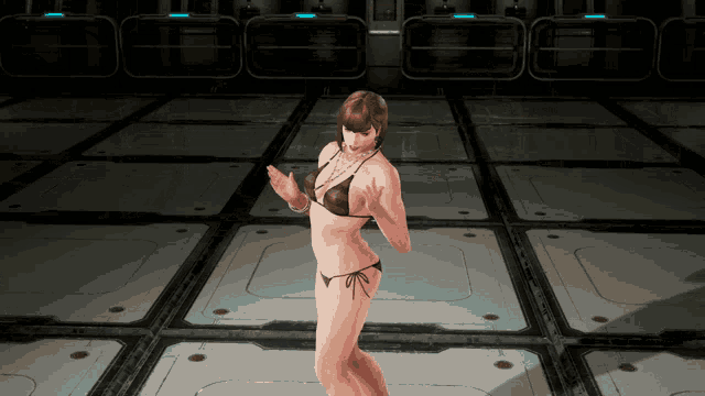 a woman in a bikini is standing in a room