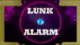 a purple and pink sign that says junk alarm on it