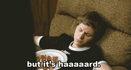 a man is laying on a couch with a plate of bacon and the words but it 's haaaaard