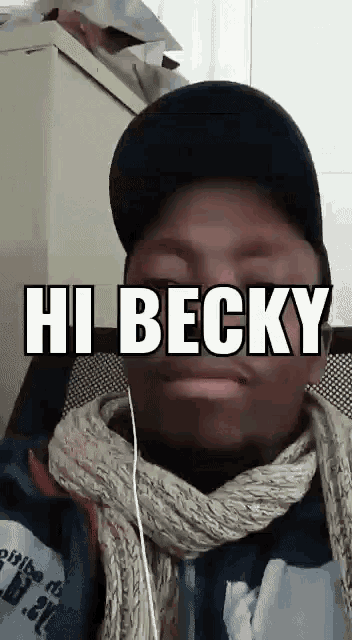 a man wearing a scarf and ear buds says hi becky
