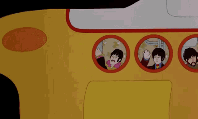 a cartoon of the beatles in a yellow submarine .
