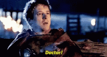 a man in a cape is saying doctor in a movie scene .