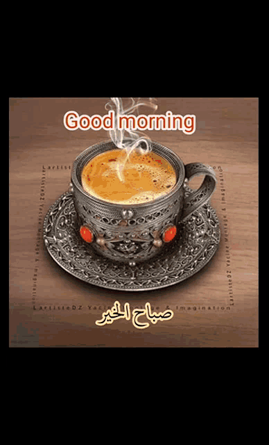 a cup of coffee on a saucer with the words good morning written on the top