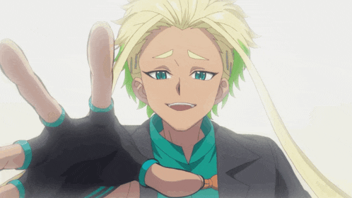 a man with blonde hair and green eyes is wearing a black suit