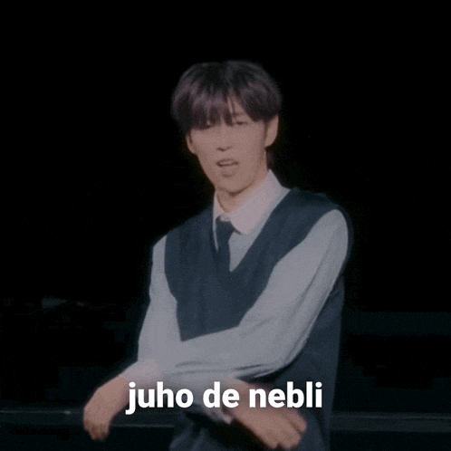 a man in a vest and tie says juho de nebui