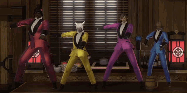 four men in tuxedos are dancing in a room