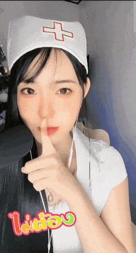 a woman in a nurse costume holds her finger to her mouth