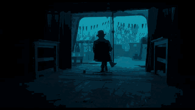 a silhouette of a man in a hat is standing in a dark room