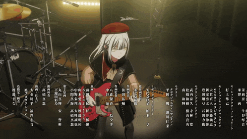 a woman with long white hair is playing a guitar in front of a drum set that says w on it