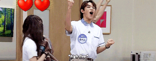 a man in a white shirt with a name tag that says nct