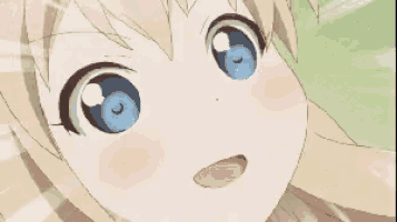 a girl with blonde hair and blue eyes looks up at the camera