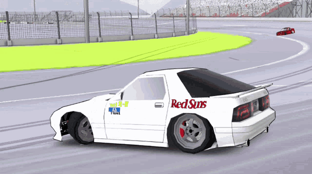 a race car with red suns written on the side