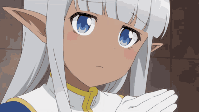 a girl with white hair and blue eyes is looking at the camera