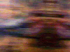 a blurry picture of a person 's face with a blurred background