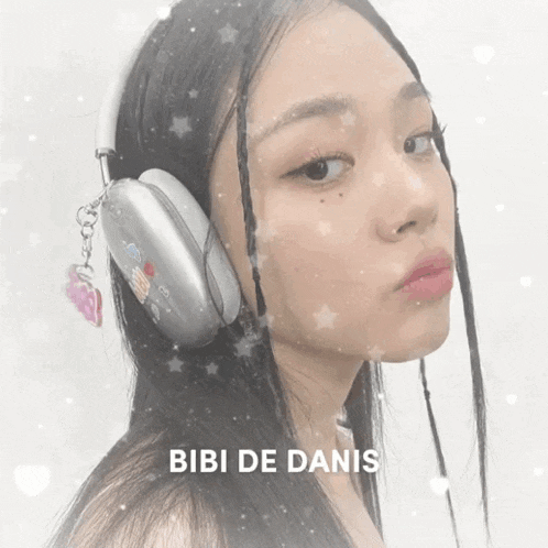 a woman wearing headphones with the name bibi de danis on the bottom right
