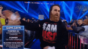 a man in a black shirt that says sam usa on it