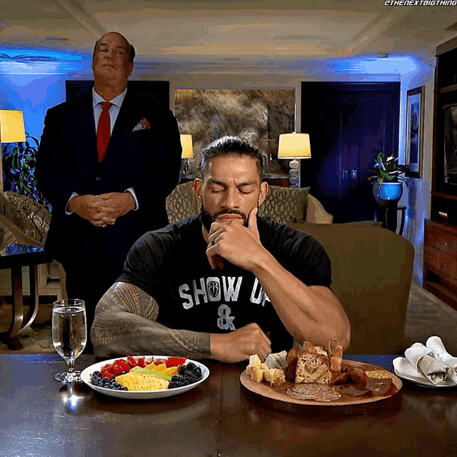Roman Reigns Food GIF - Roman Reigns Food Head Of The Table GIFs