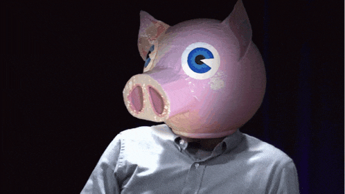 a man wears a pig mask with blue eyes