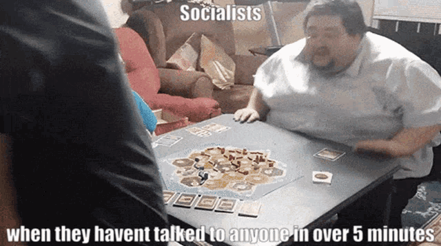 a man playing a board game with the caption socialists when they havent talked to anyone