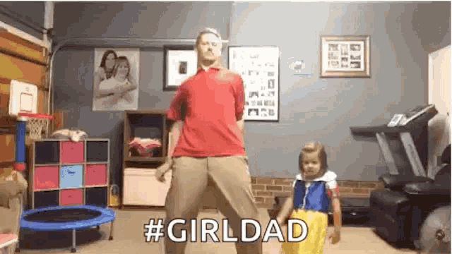 a man and a little girl are dancing in a room with the words girldad written on the bottom .