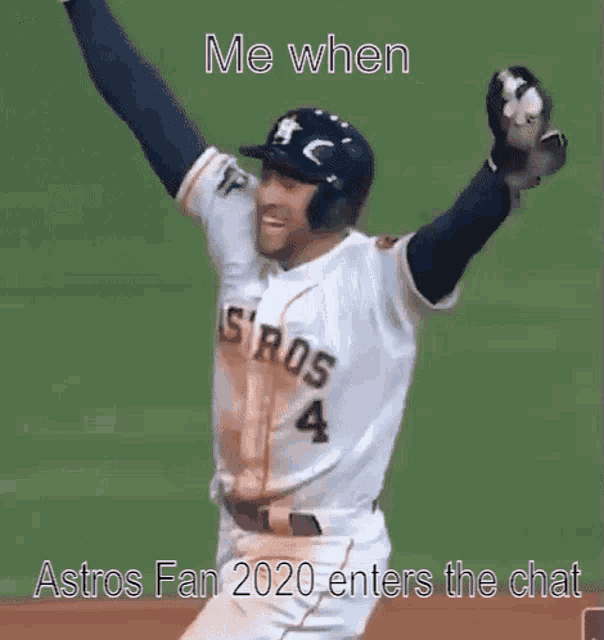 a baseball player is holding his arms in the air while wearing a number 4 jersey .