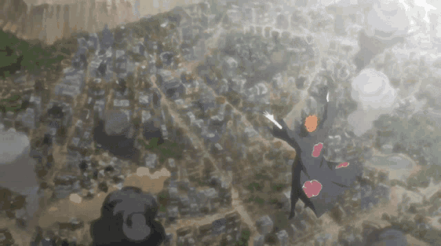 a man in a black cape with the letter a on his chest is flying over a city