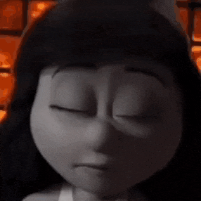 a close up of a cartoon character 's face with his eyes closed