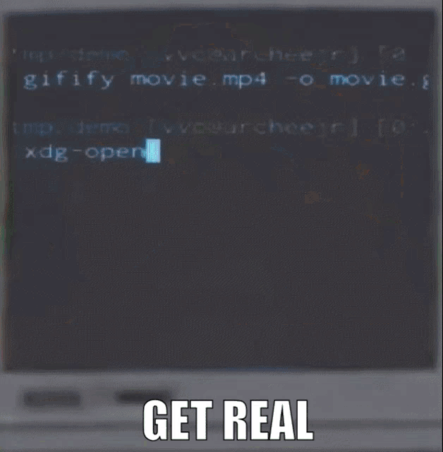a computer monitor with the words get real on the bottom right