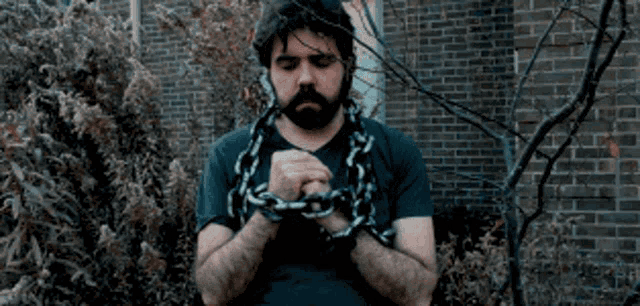 Chained Chained Man GIF