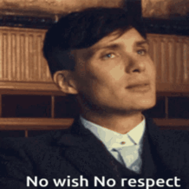 a man in a suit and tie with the words no wish no respect above him