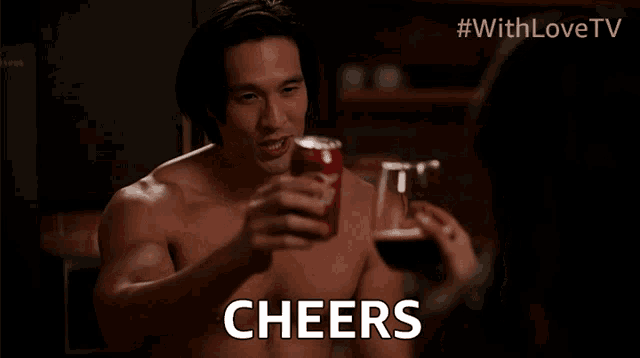 a shirtless man is holding a glass of wine and the word cheers is above him
