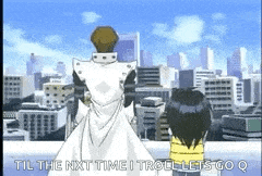 a man and a boy are standing on a rooftop looking at a city .
