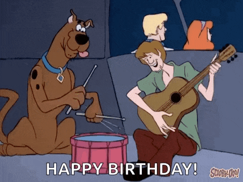 scooby doo and shaggy are playing drums and guitar in a cartoon .