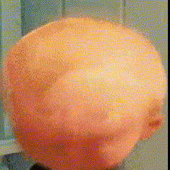 a close up of a person 's head with a blurred image