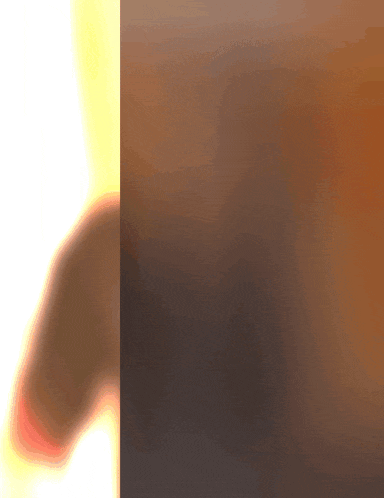 a blurry picture of a person standing in front of a wall